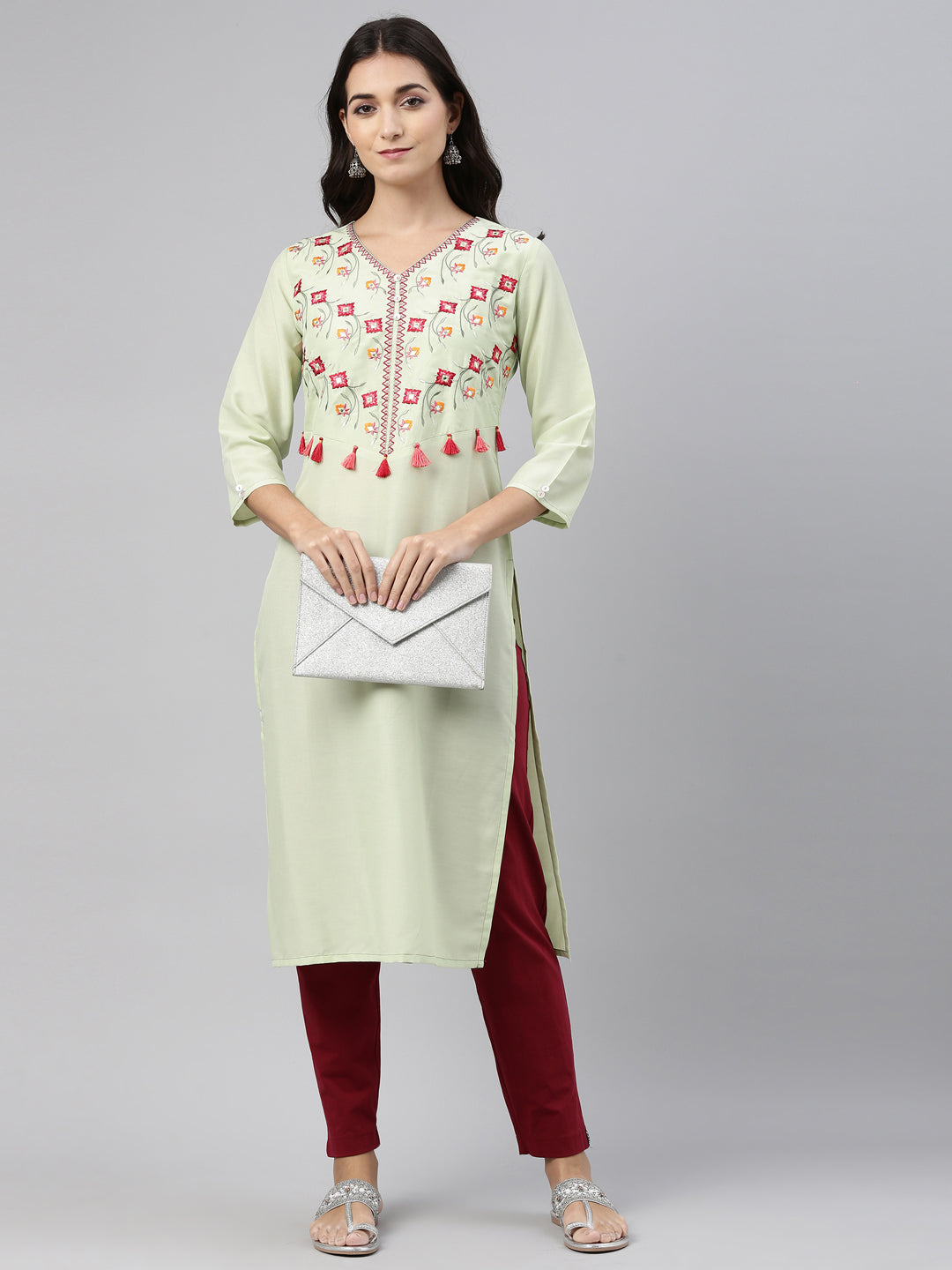 Neerus Green muslin embroidered kurti straight silhouette - front view