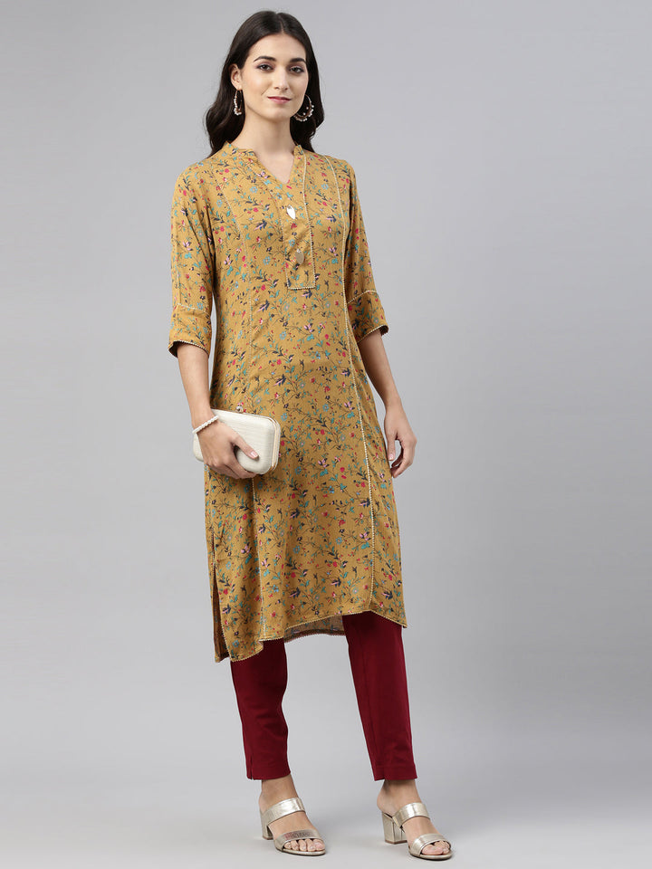 Neerus Yellow rayon solid kurti - front view