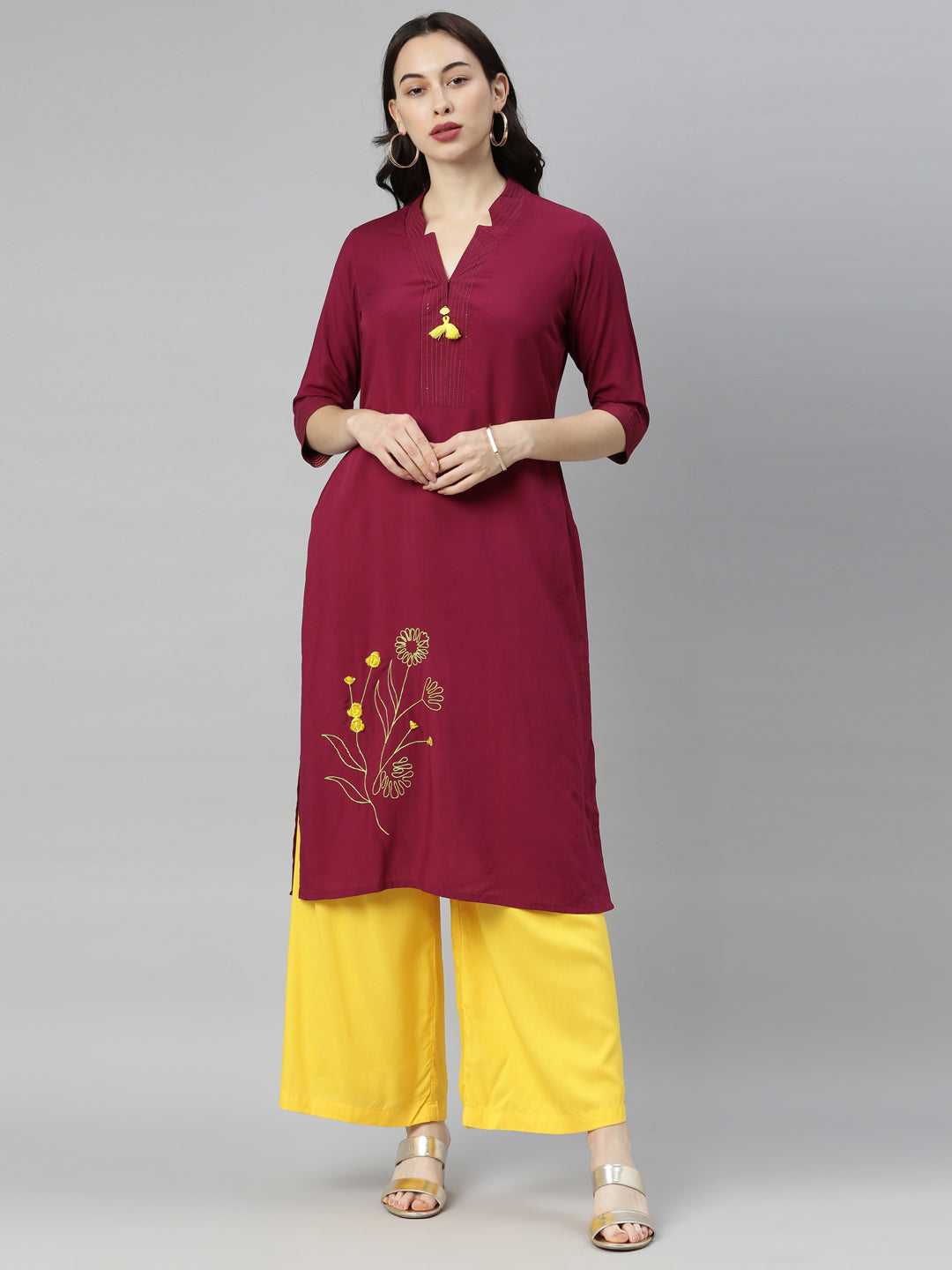 Neerus Maroon embroidered straight kurta - front view
