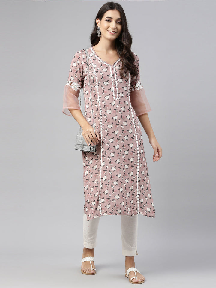 Neerus Pink rayon solid kurti - front view