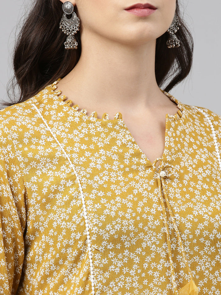 Neerus Yellow chiffon solid kurti - back view