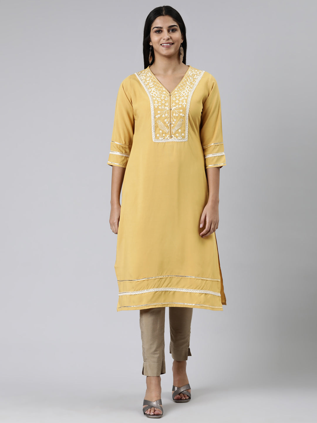 Neerus Yellow viscose rayon embroidered kurti - front view