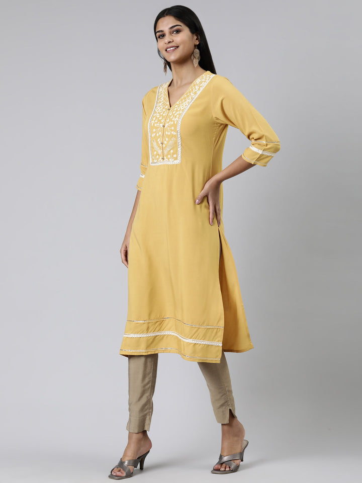 Neerus Yellow viscose rayon embroidered kurti - back view