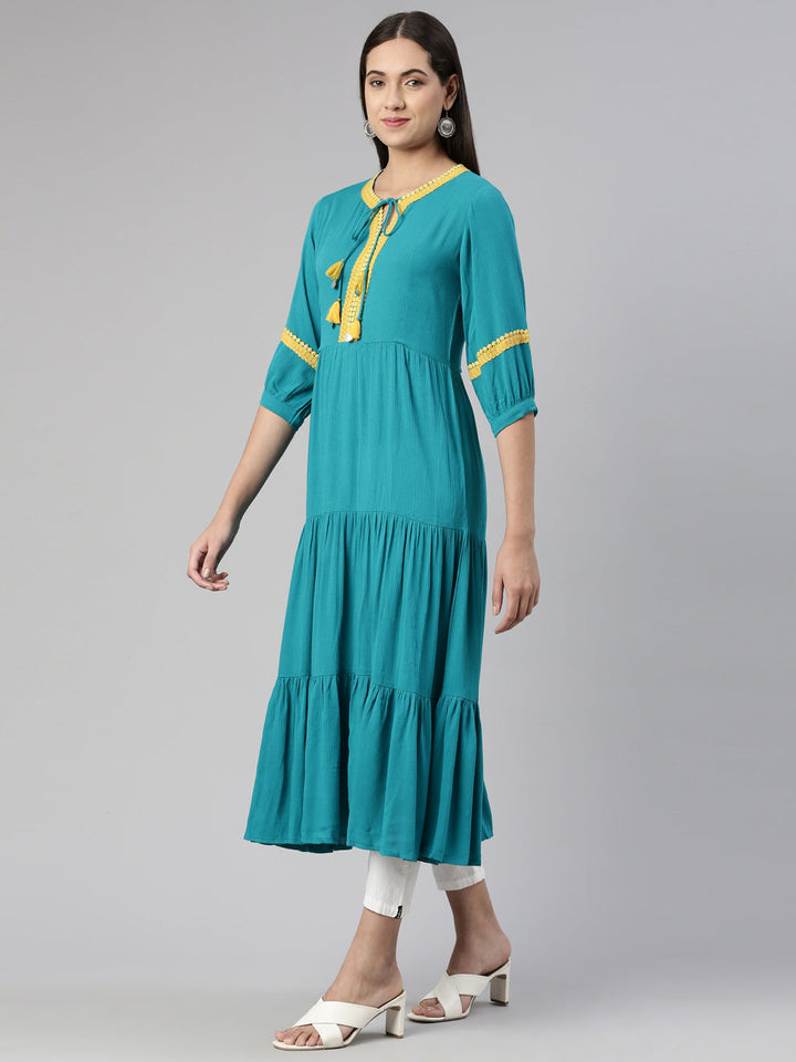 Neerus Green cotton silk anarkali kurti - back view
