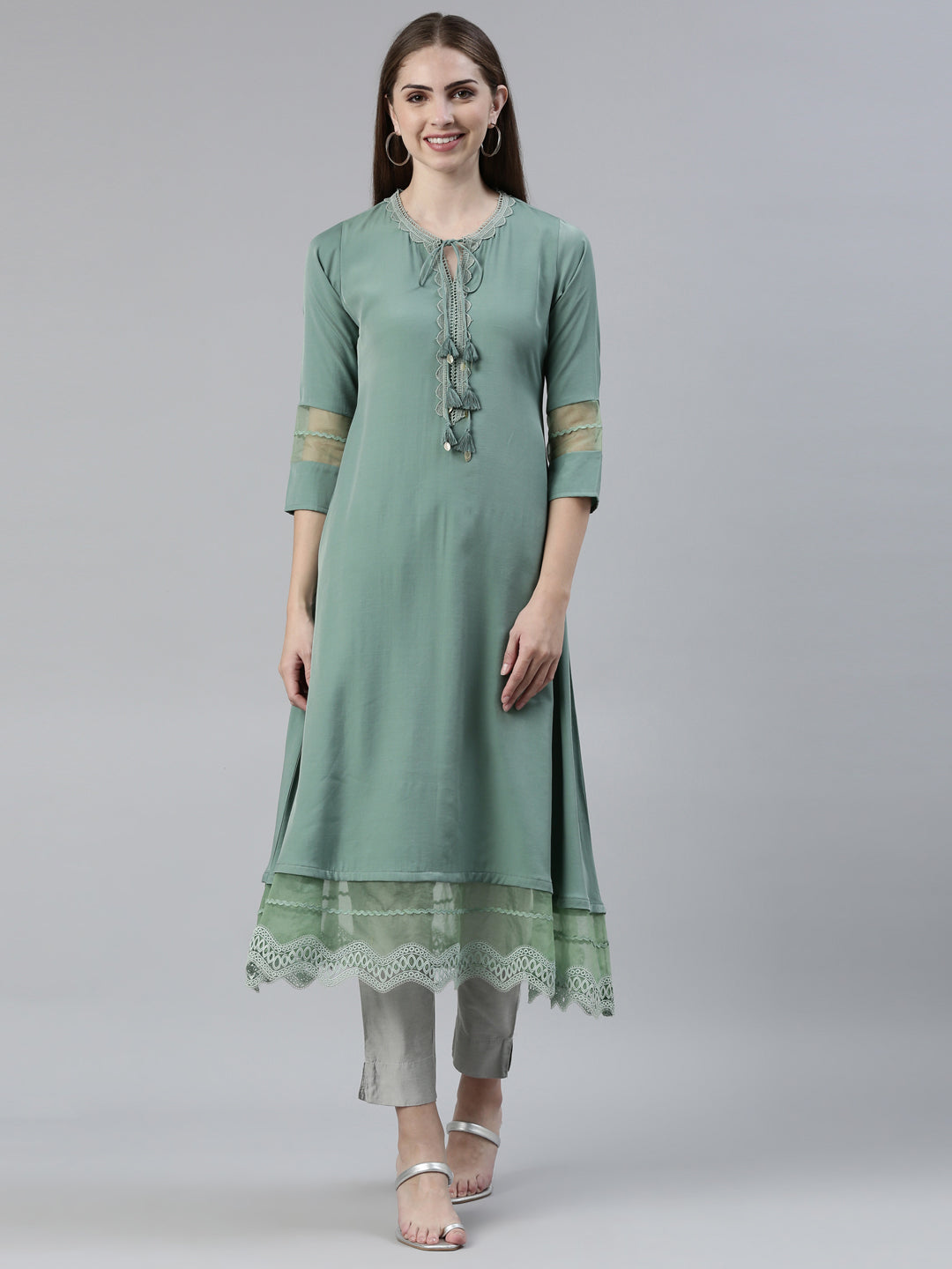 Neerus Green viscose rayon solid A-line kurti - front view