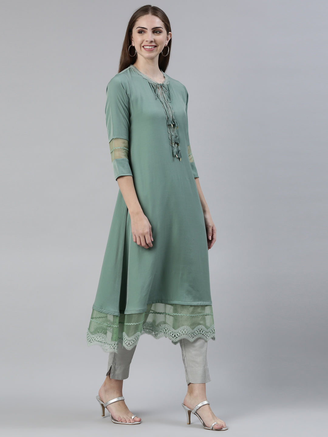 Neerus Green viscose rayon solid A-line kurti - back view