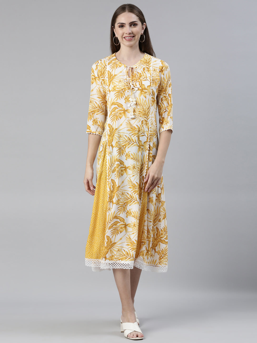 Neerus Yellow chiffon printed A-line kurti - front view