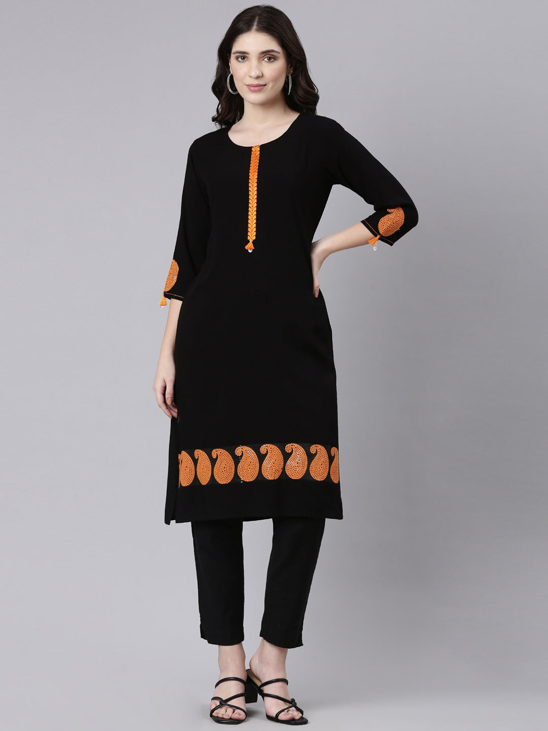 Neerus Black rayon solid straight kurti - front view