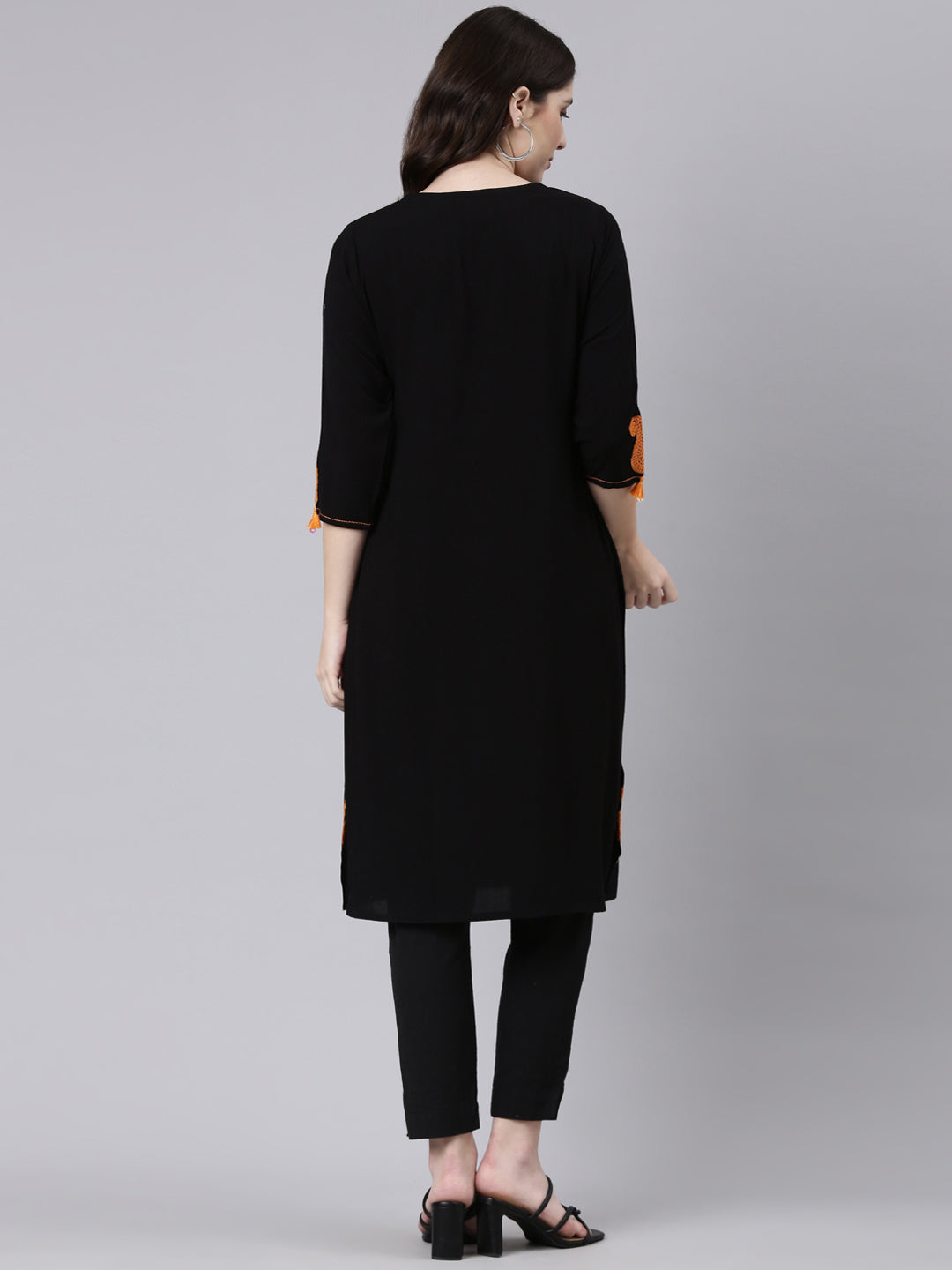 Neerus Black rayon solid straight kurti - side view