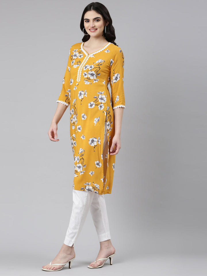 Neerus Yellow rayon solid straight kurti - back view