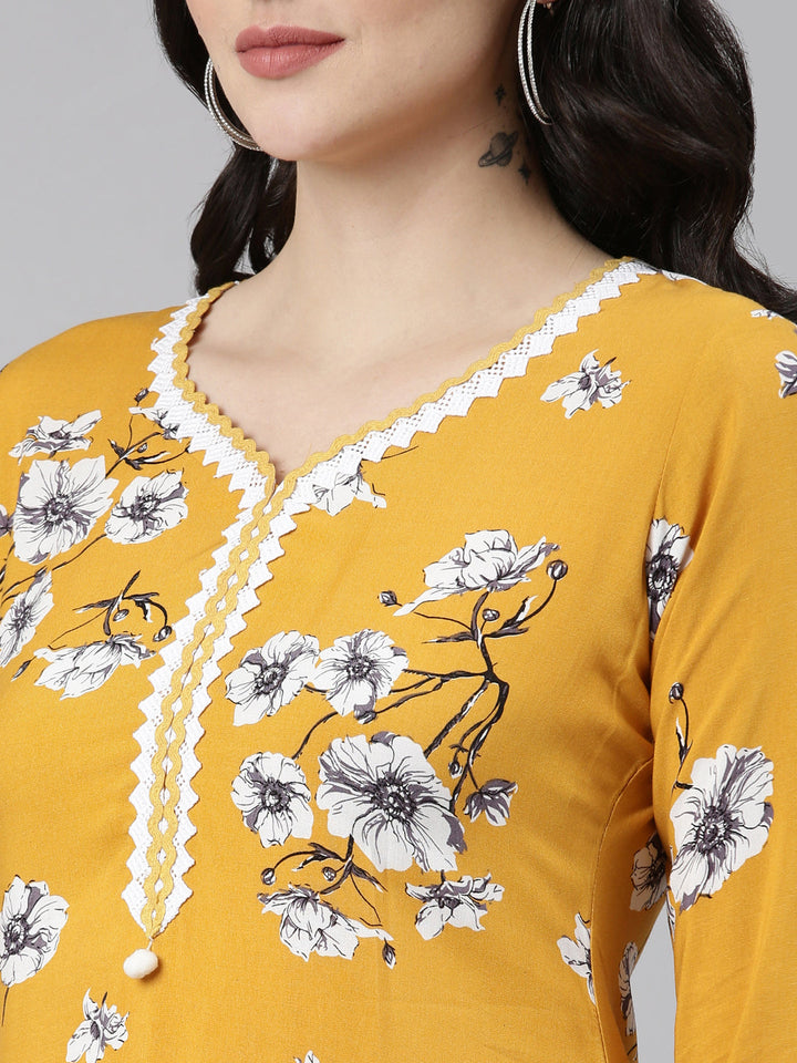 Neerus Yellow rayon solid straight kurti - detail view 1