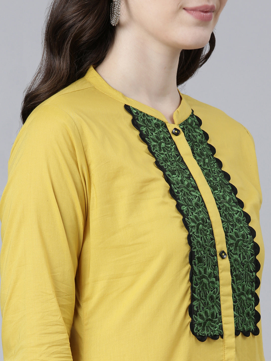 Neerus Yellow cotton solid straight kurti - detail view 1
