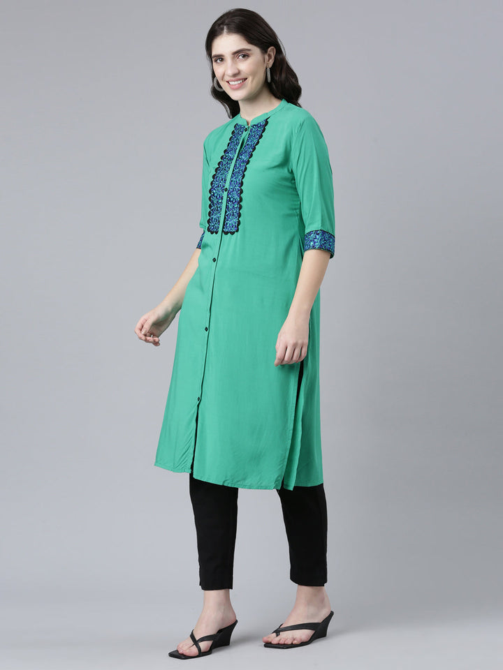 Neerus Green rayon solid straight kurti - back view