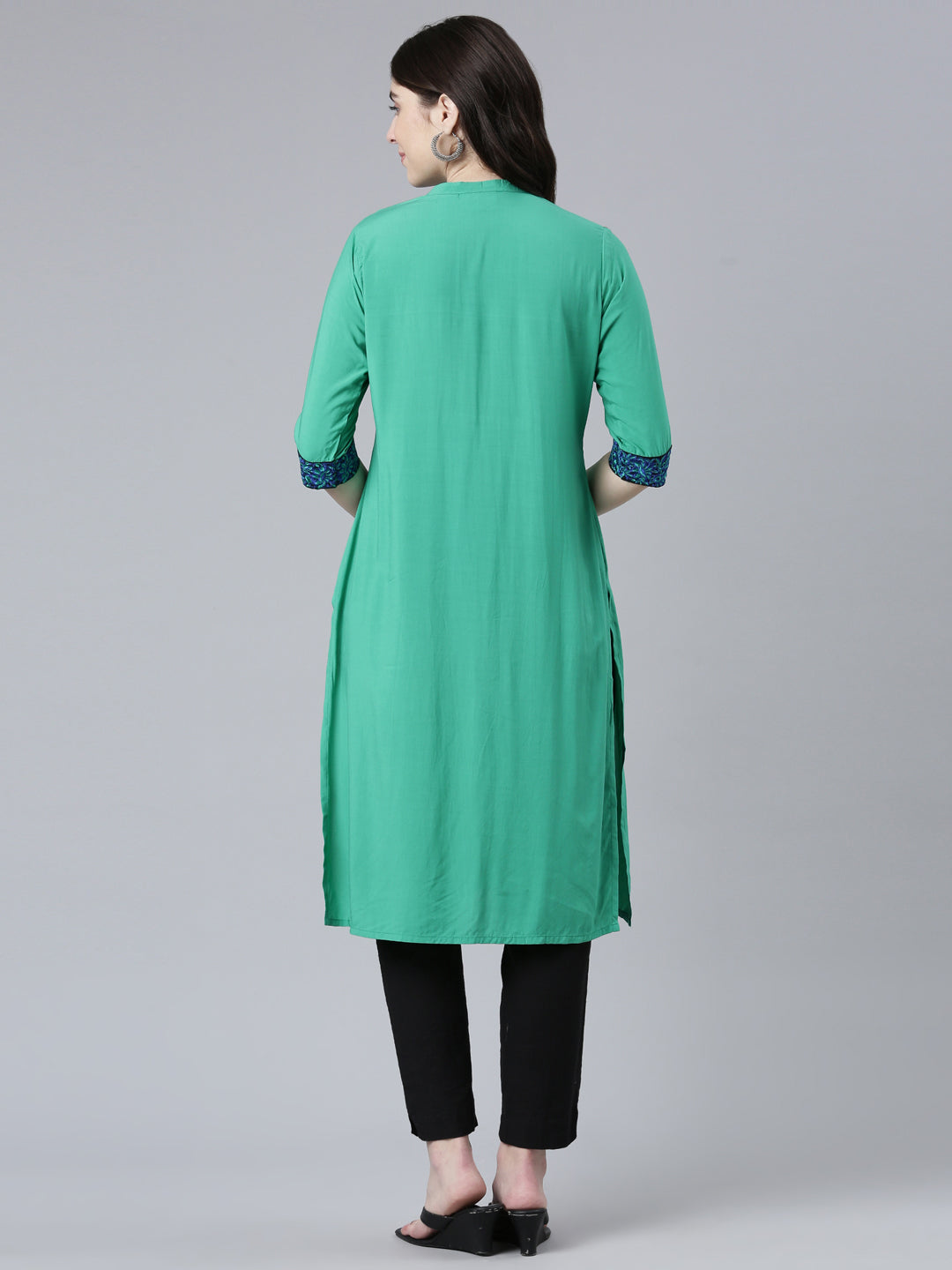 Neerus Green rayon solid straight kurti - side view