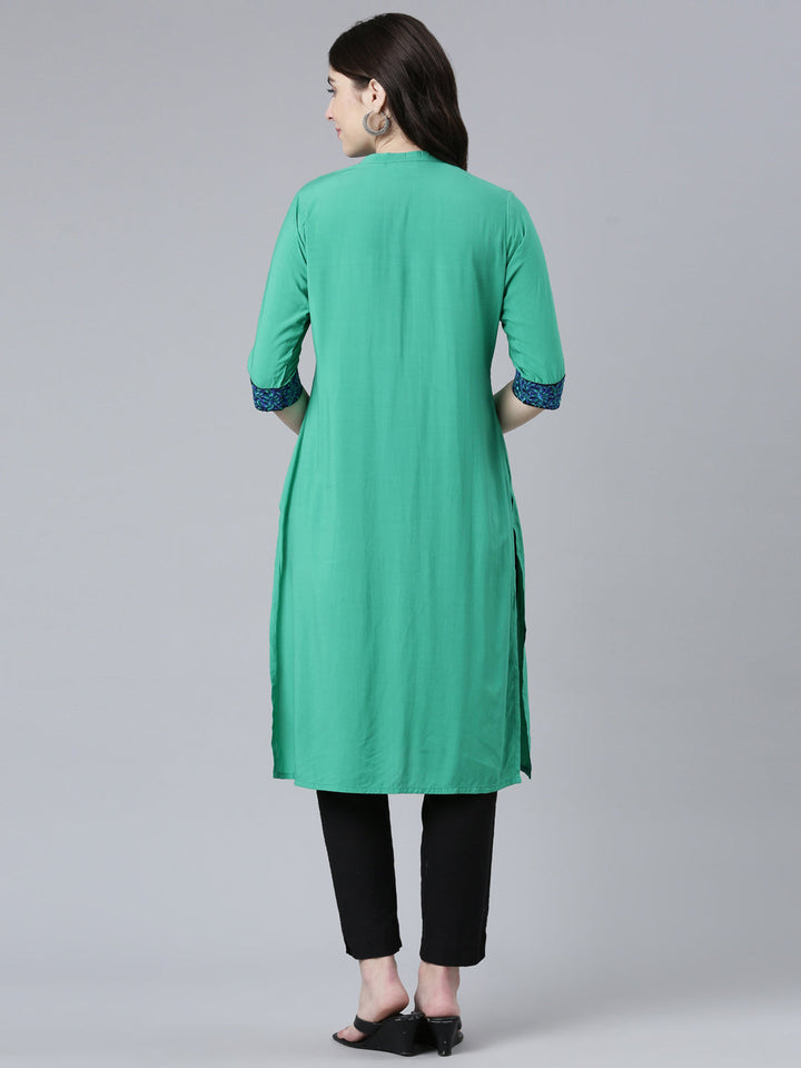 Neerus Green rayon solid straight kurti - side view