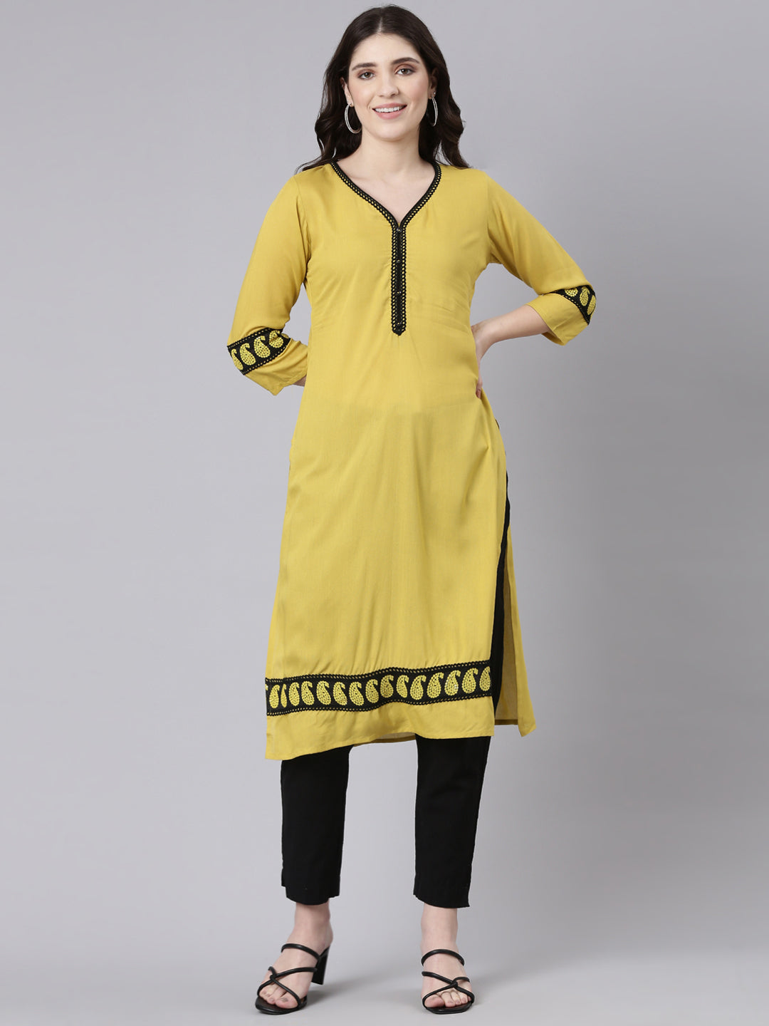 Neerus Green viscose rayon solid straight kurti - front view