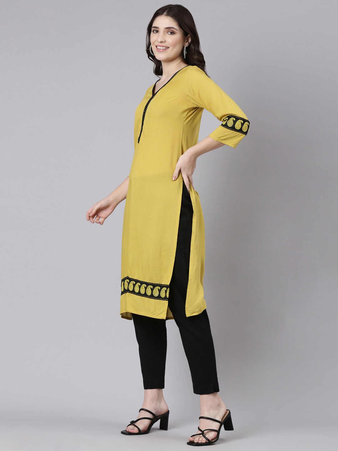 Neerus Green viscose rayon solid straight kurti - back view