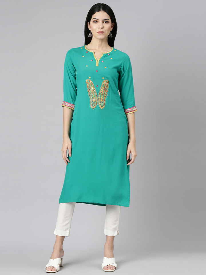 Neerus Green rayon solid straight kurti - front view