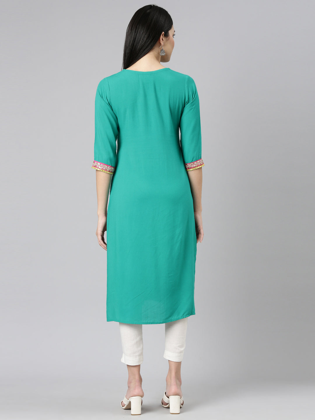 Neerus Green rayon solid straight kurti - side view