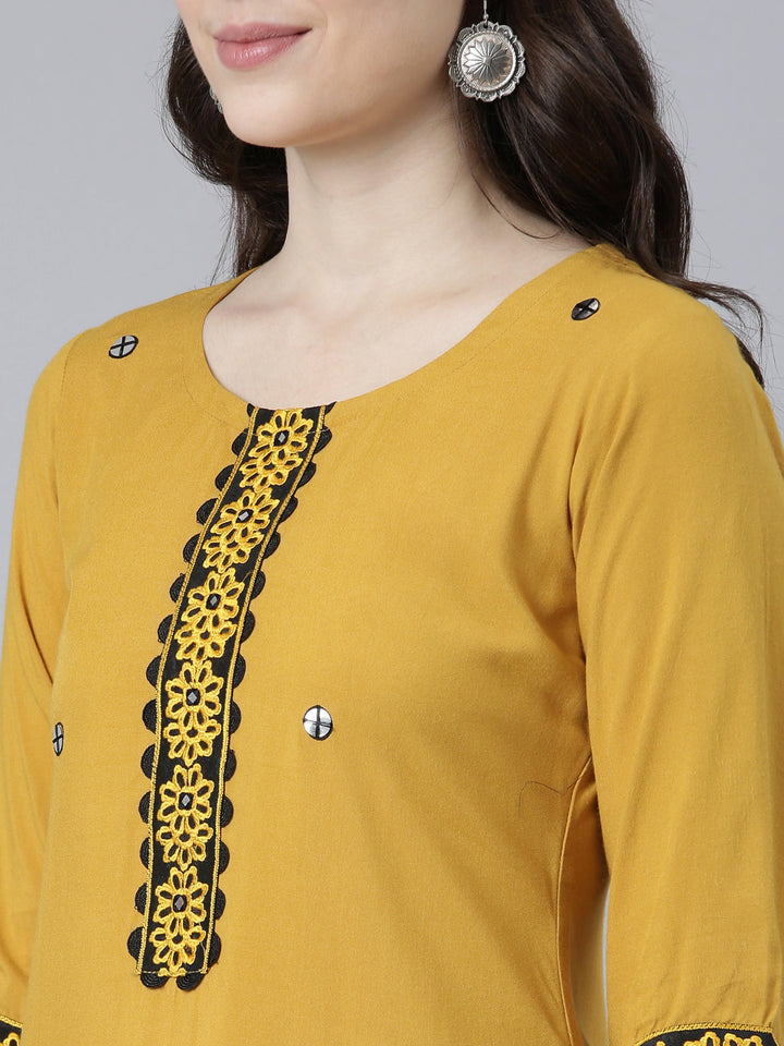 Neerus Yellow rayon solid straight kurti - detail view 1