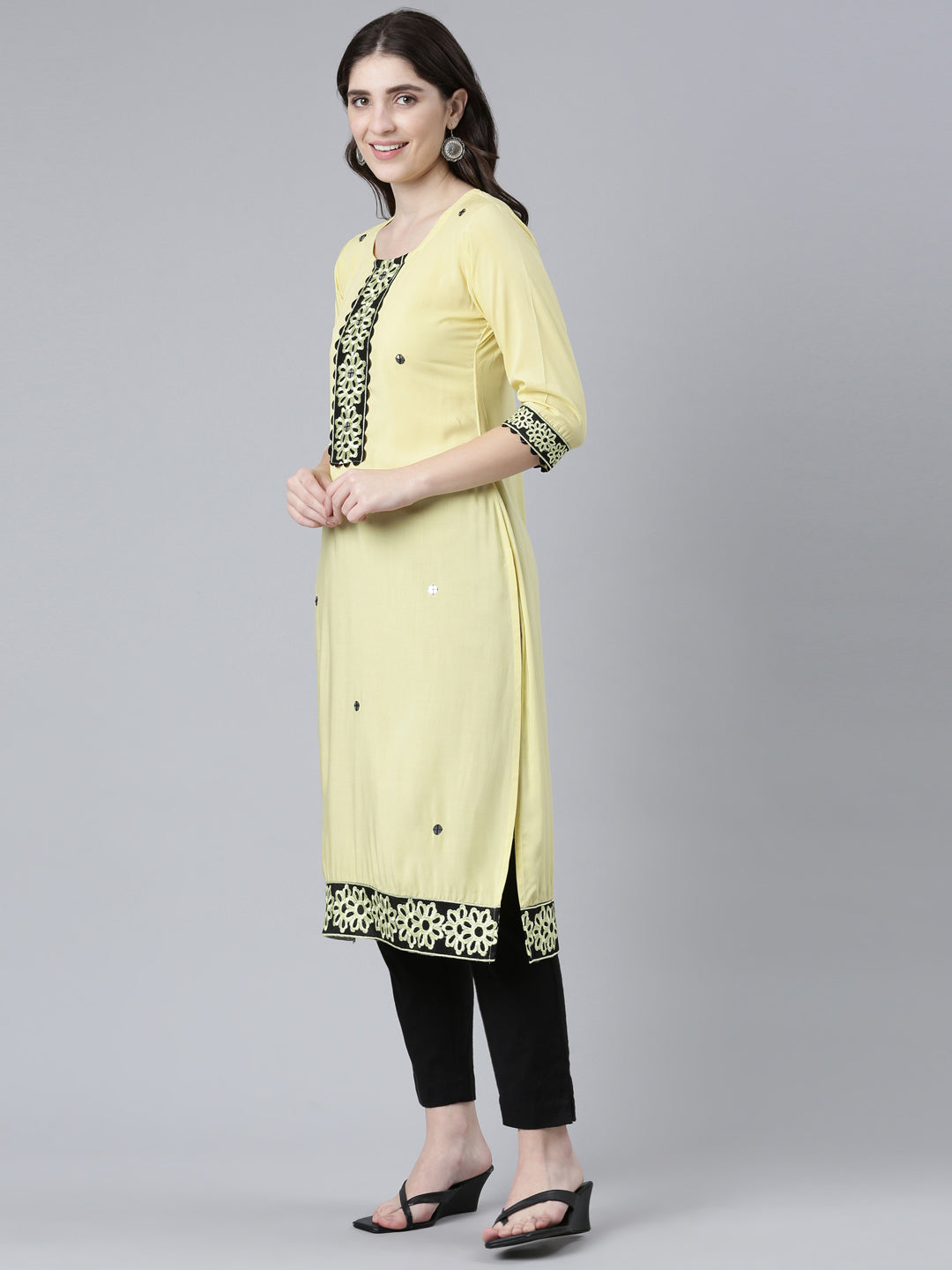 Neerus Yellow rayon solid straight kurti - back view