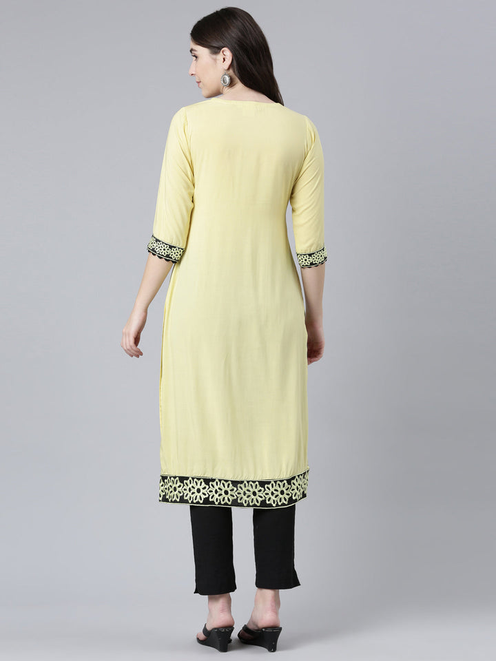 Neerus Yellow rayon solid straight kurti - side view