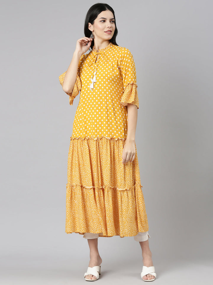 Neerus Yellow chiffon printed straight kurti - front view