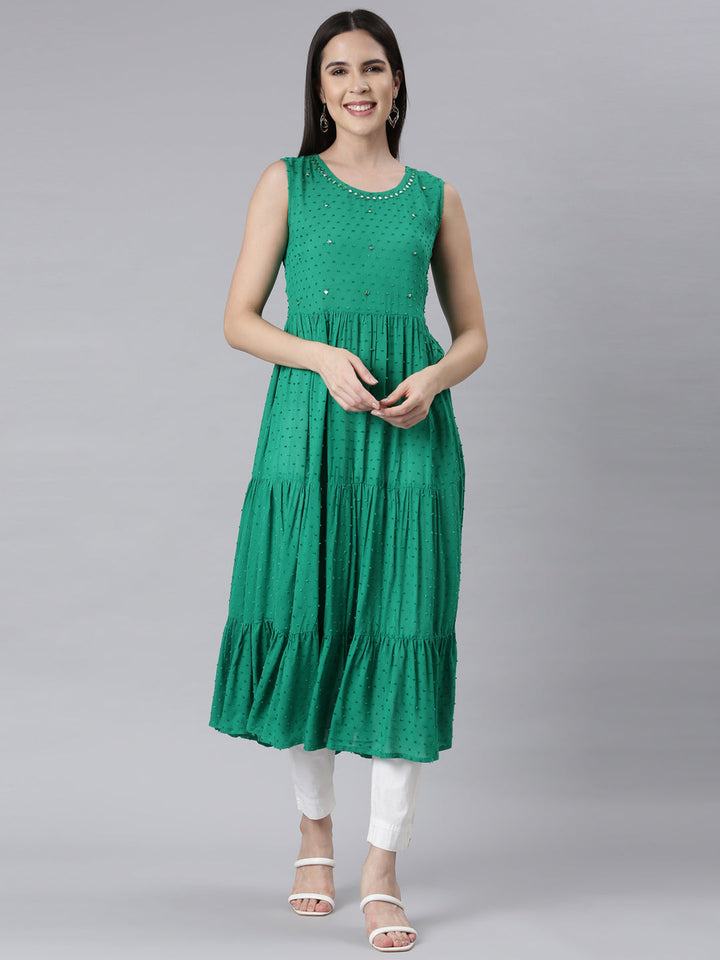 Neerus Green cotton embellished anarkali kurti - front view