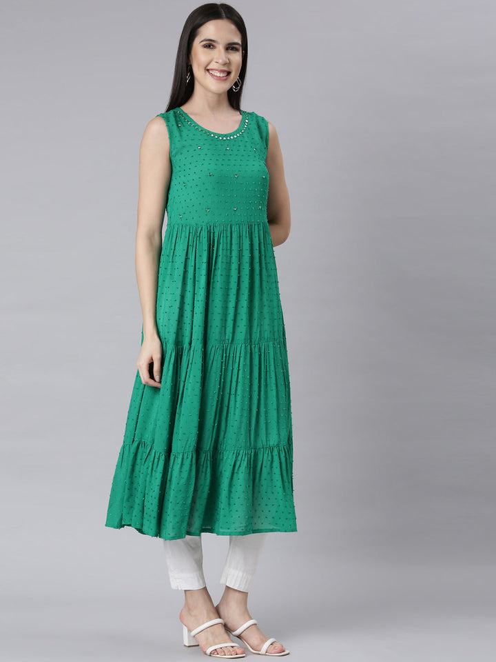 Neerus Green cotton embellished anarkali kurti - back view