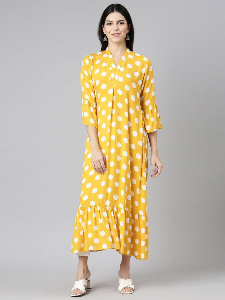 Neerus Yellow rayon printed straight kurti - front view