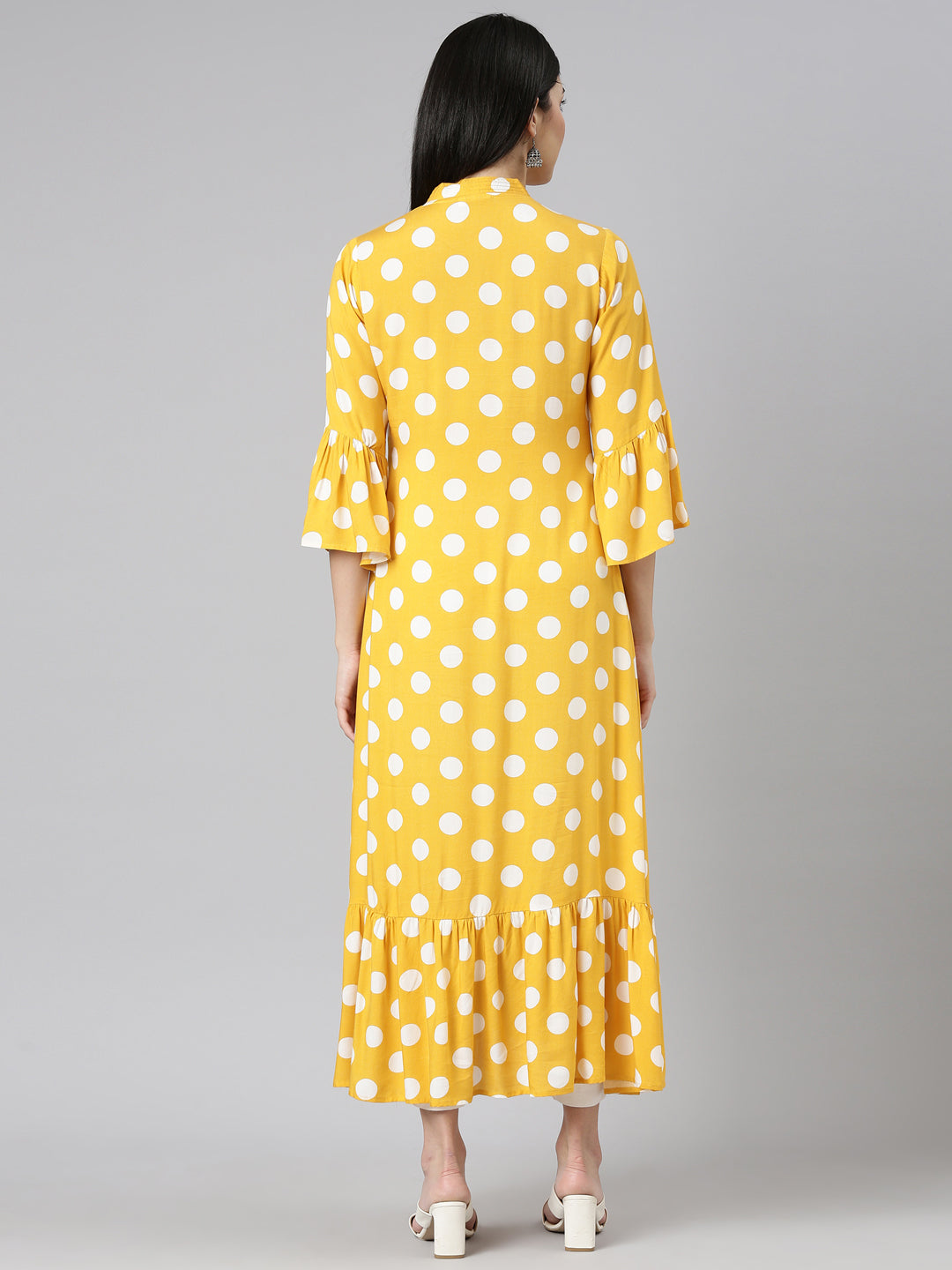 Neerus Yellow rayon printed straight kurti - side view