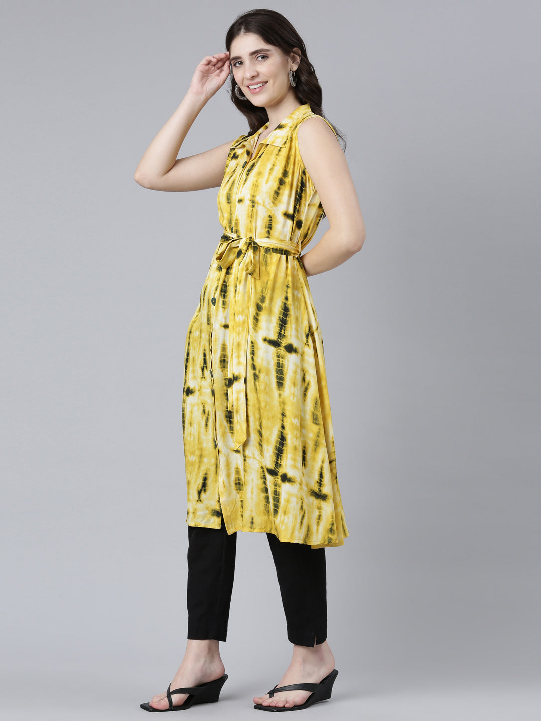 Neerus Yellow rayon printed A-line kurti - back view