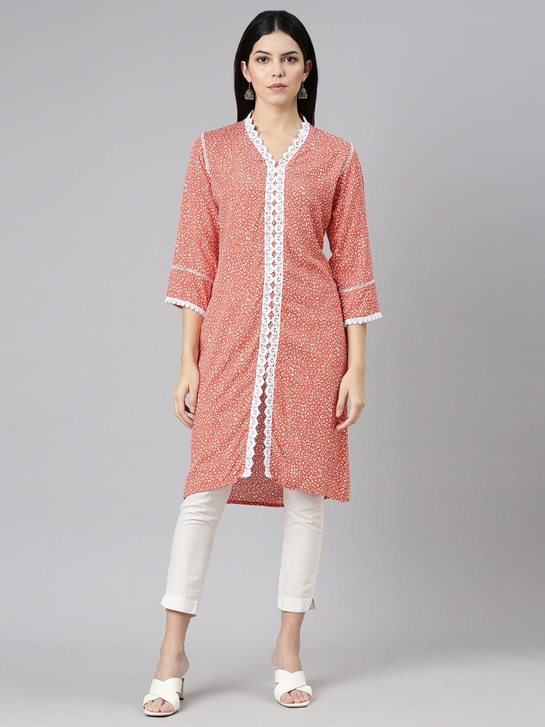 Neerus Orange rayon printed straight kurti - front view
