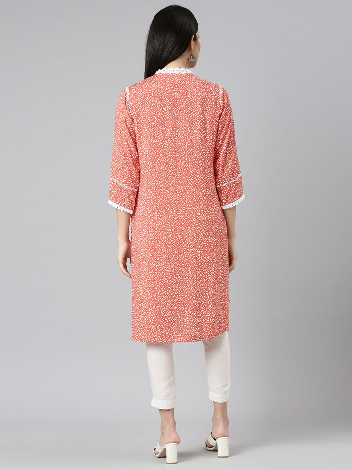 Neerus Orange rayon printed straight kurti - side view
