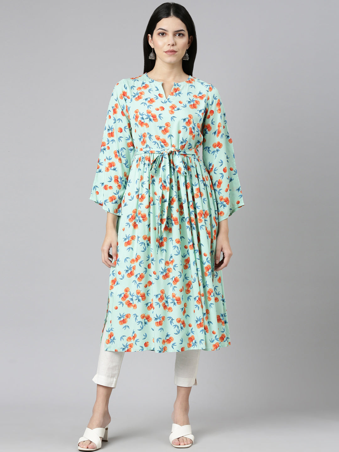 Neerus Green Rayon Printed Straight Kurti - front view