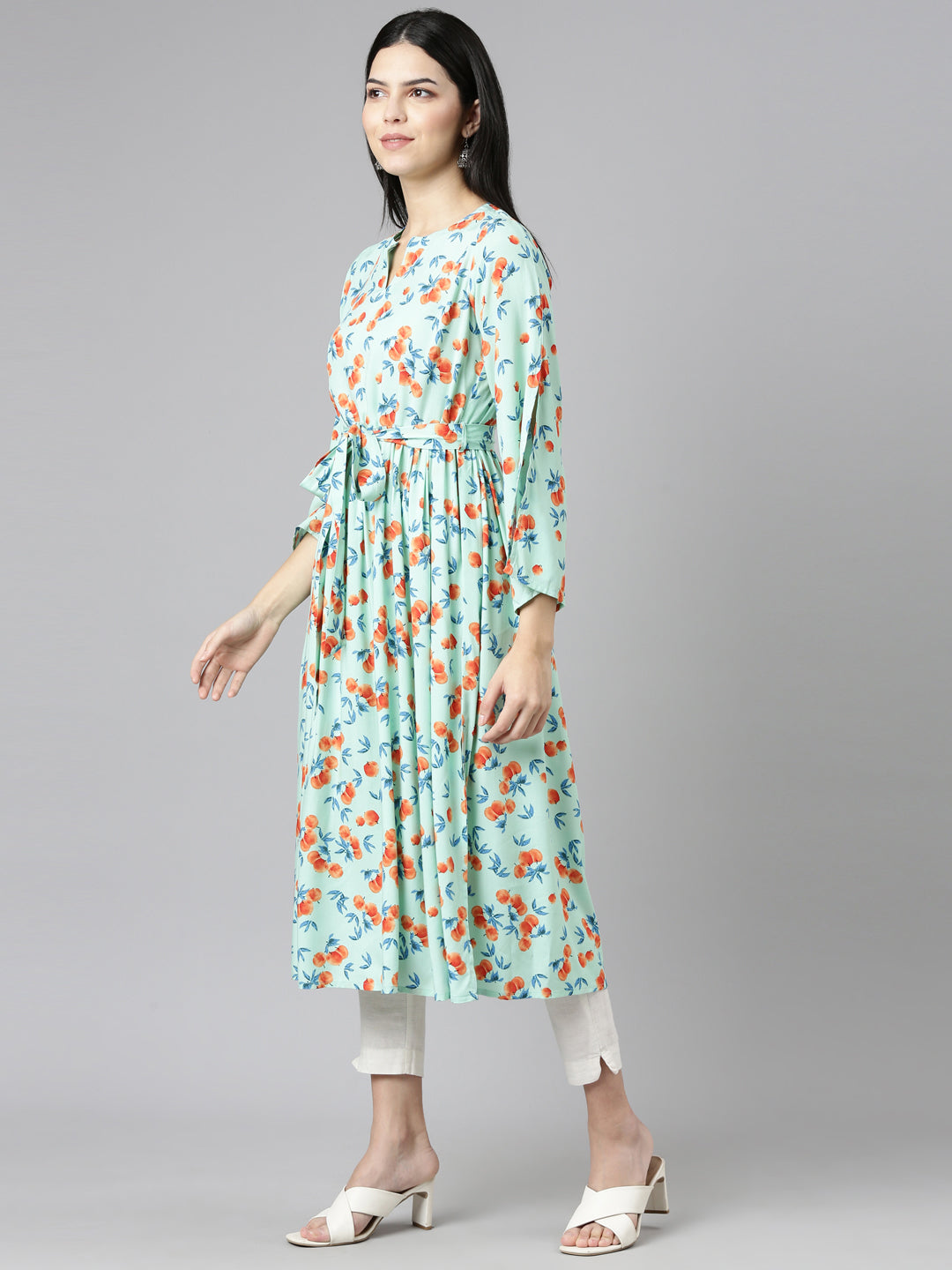 Neerus Green Rayon Printed Straight Kurti - back view