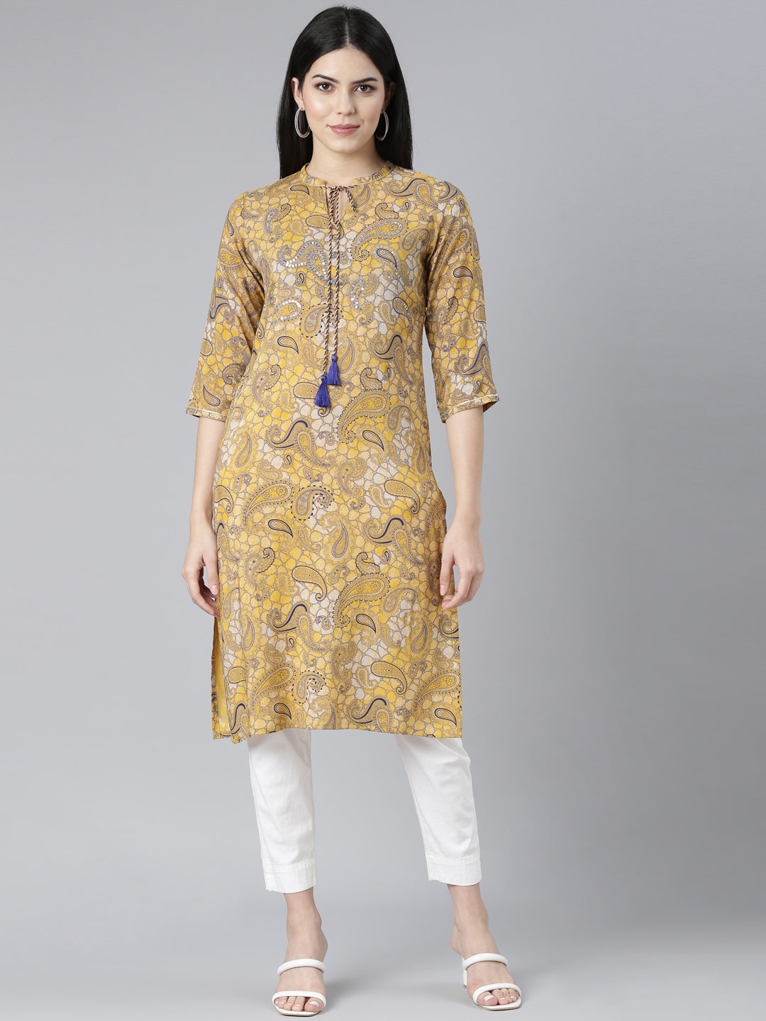 Neerus Yellow rayon printed straight kurti - front view