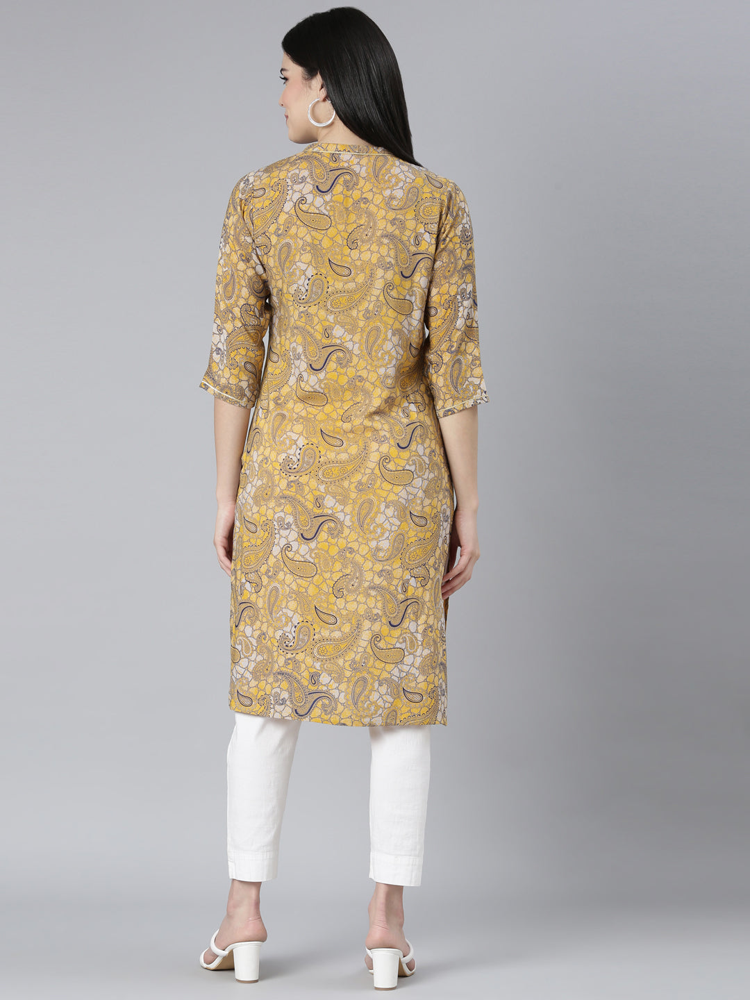 Neerus Yellow rayon printed straight kurti - side view