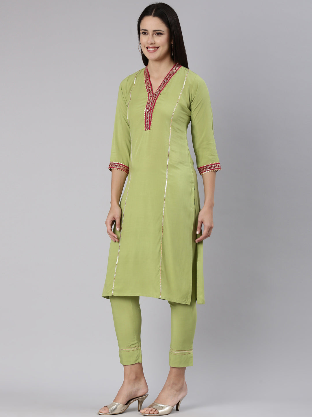 Neerus Green rayon solid kurta set - back view