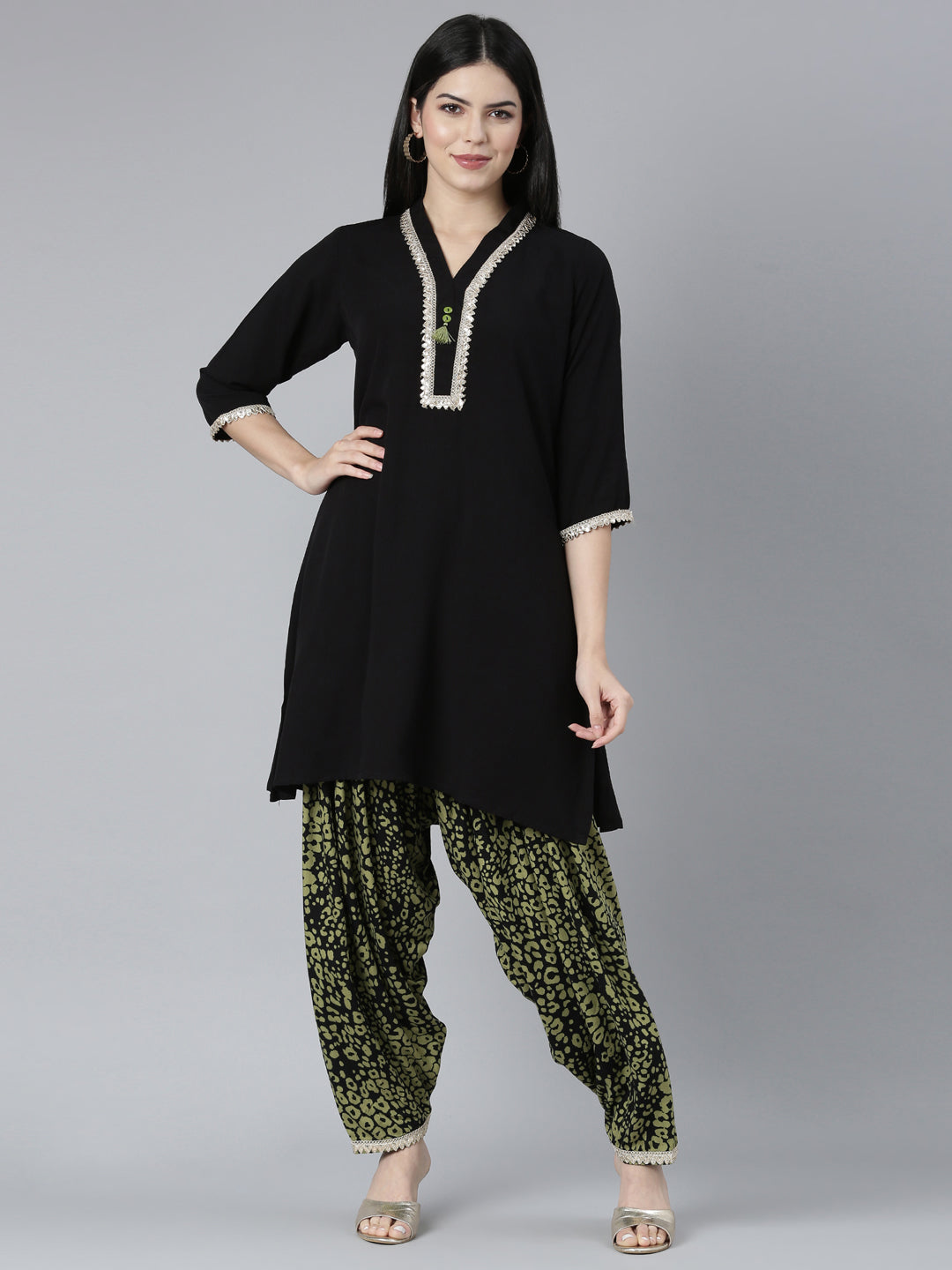 Neerus Black rayon solid kurta set - front view