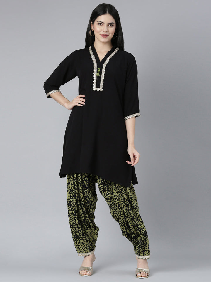 Neerus Black rayon solid kurta set - front view