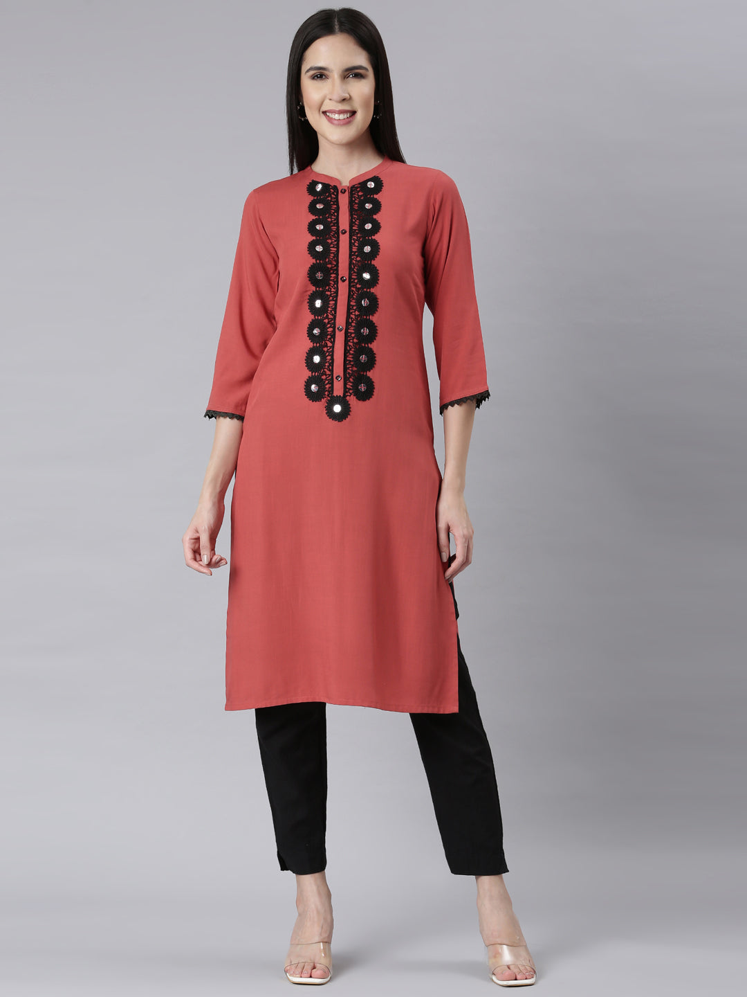 Neerus Orange rayon embellished straight kurti - front view