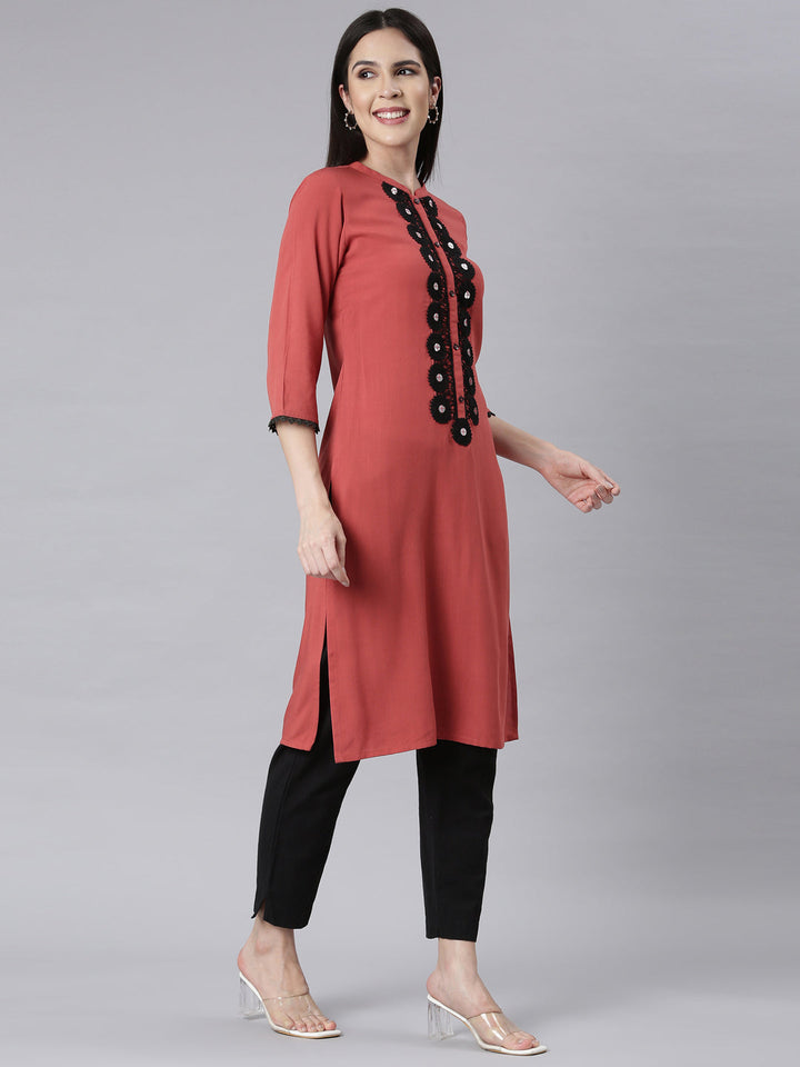 Neerus Orange rayon embellished straight kurti - back view