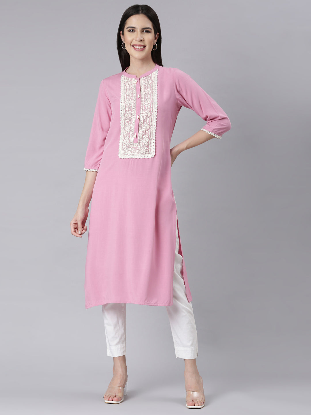 Neerus Pink rayon embellished panelled kurti - front view