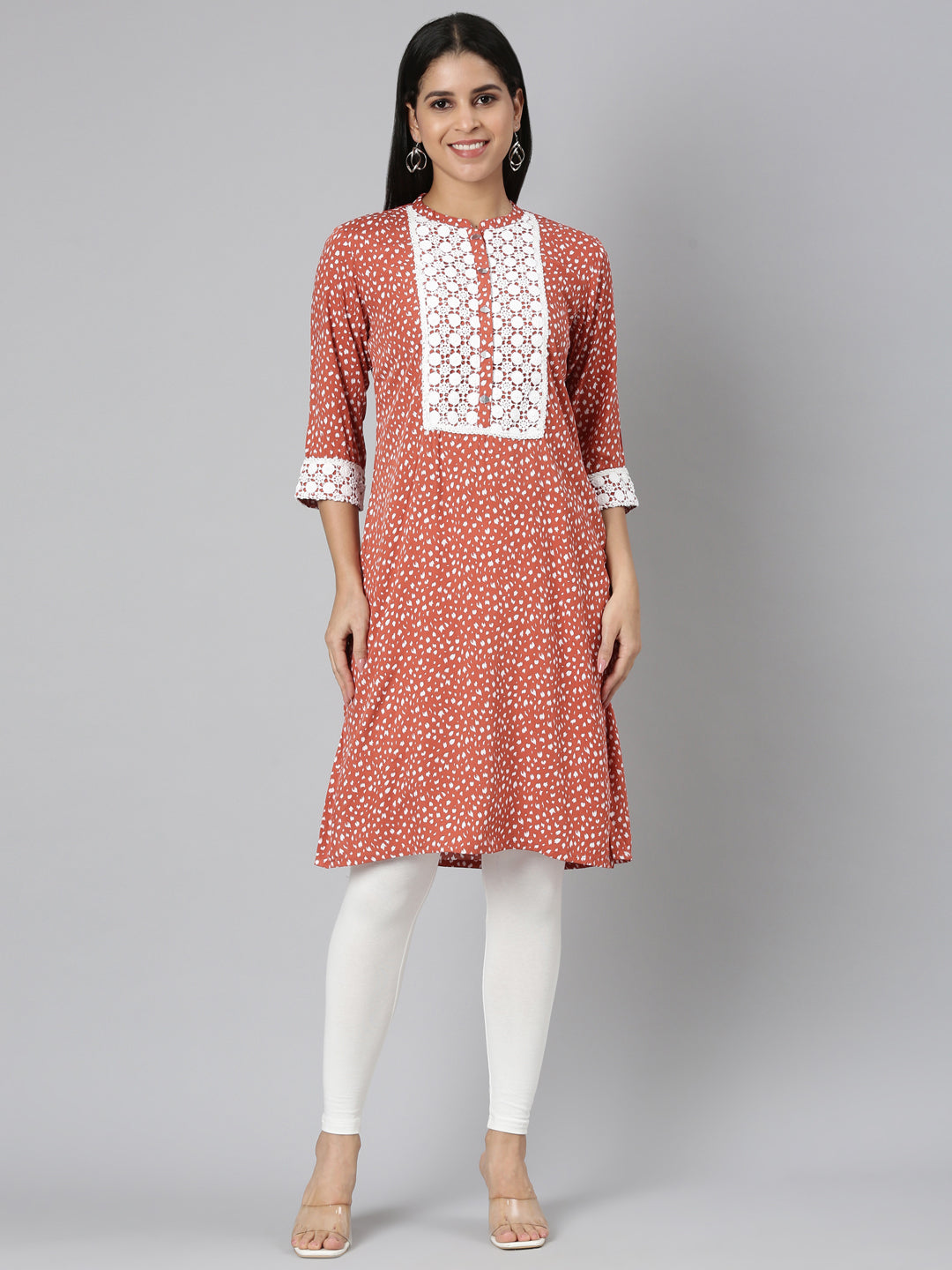 Neerus Orange rayon solid straight kurta - front view