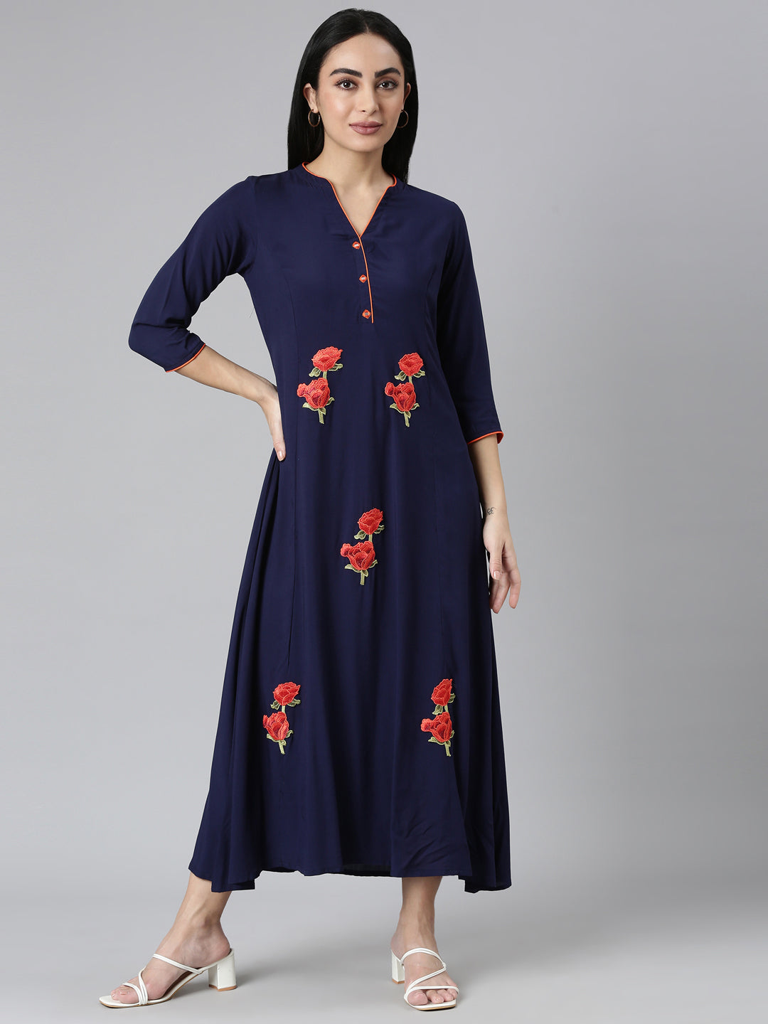 Neerus Blue rayon solid straight kurti - front view