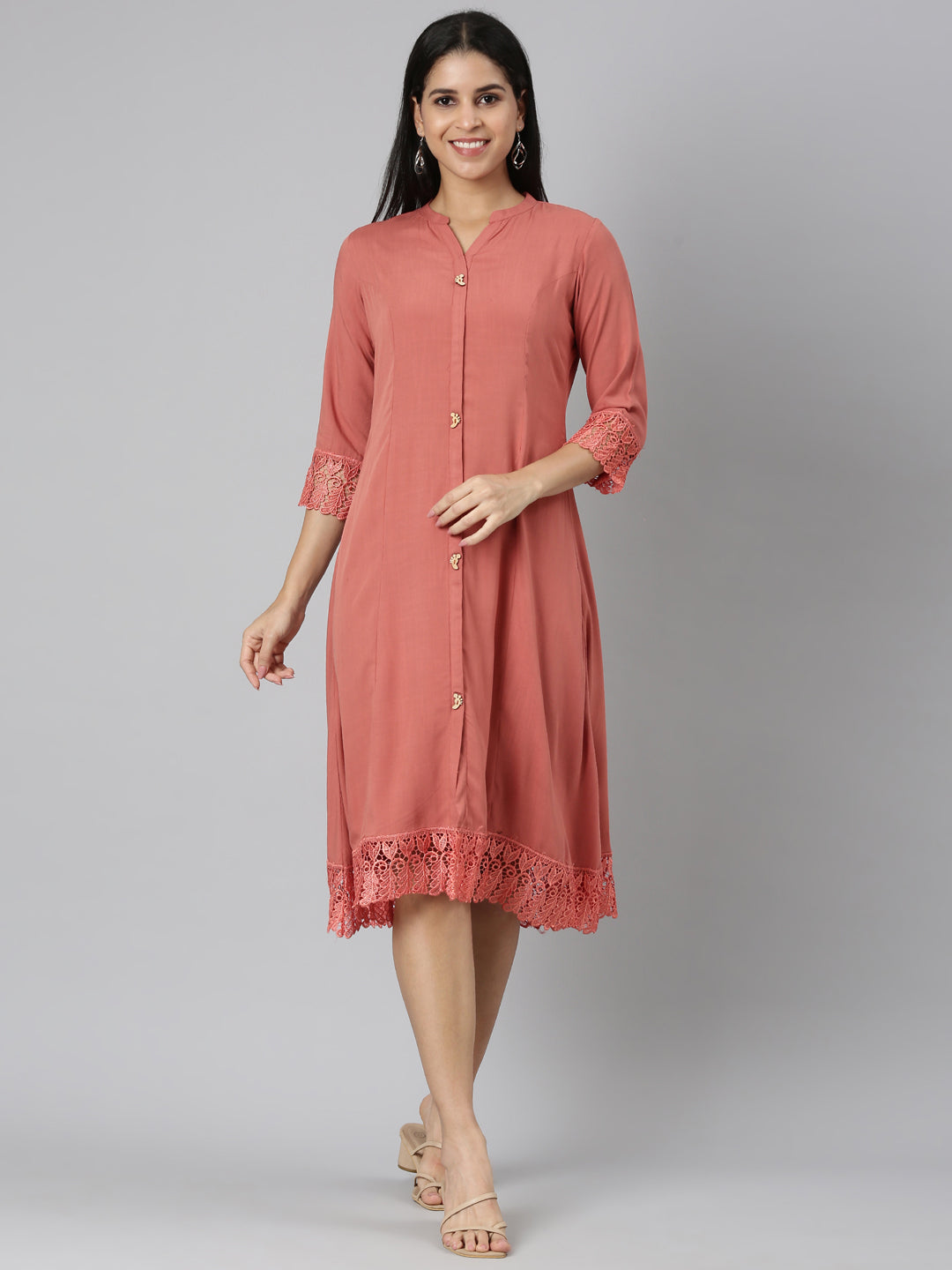 Neerus Orange rayon solid straight kurta - front view