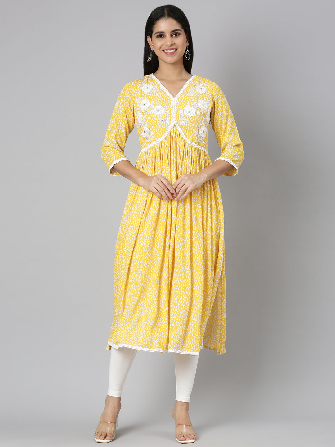 Neerus Yellow chiffon printed anarkali kurti - front view
