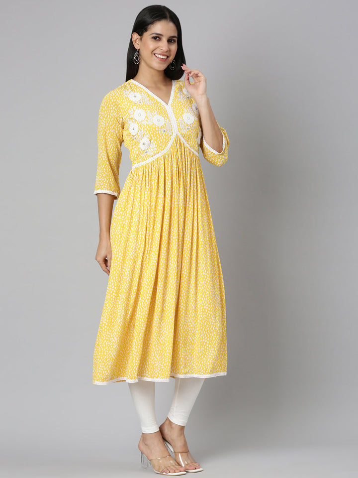 Neerus Yellow chiffon printed anarkali kurti - back view