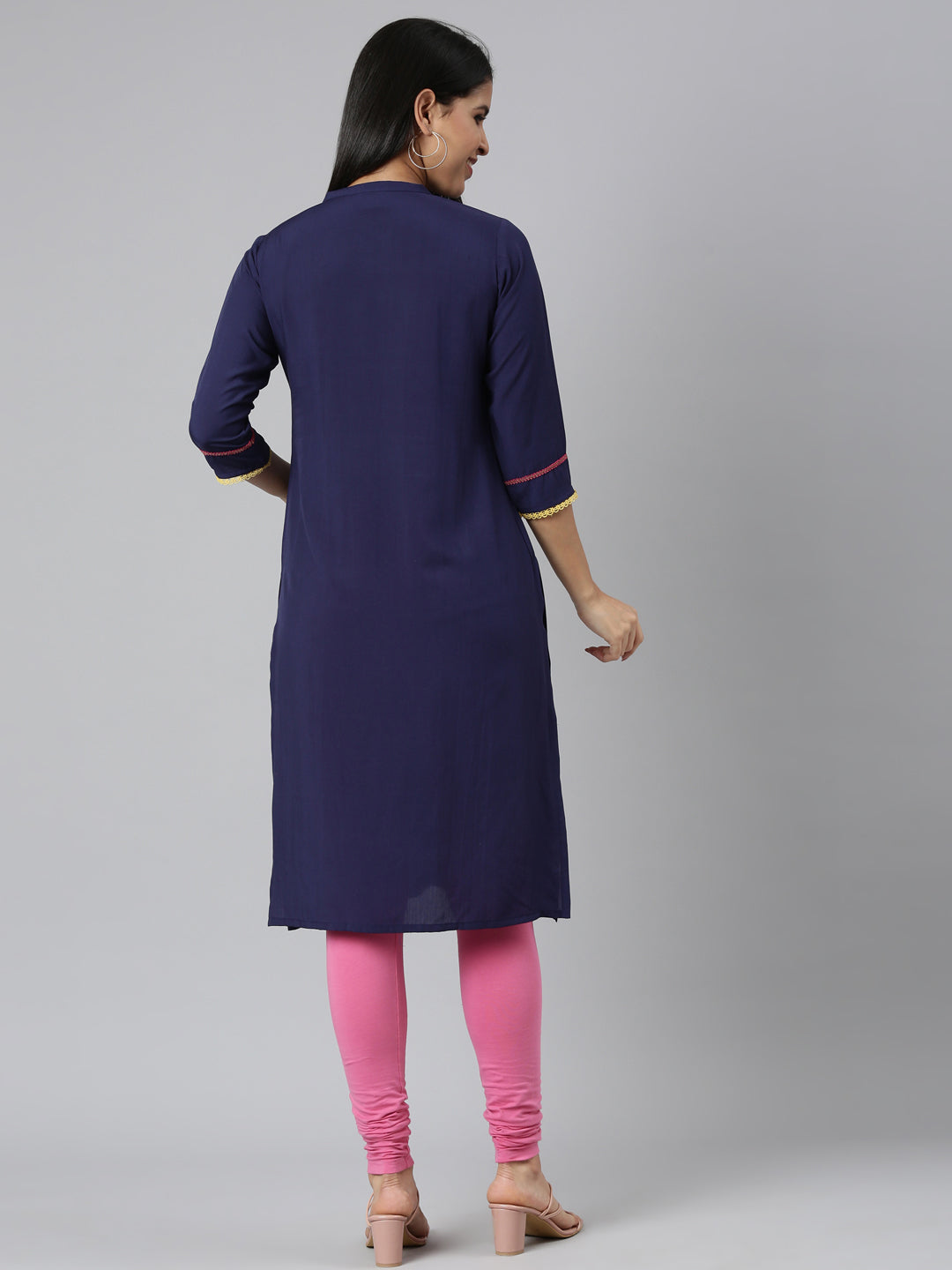Neerus Blue rayon solid straight kurti - side view